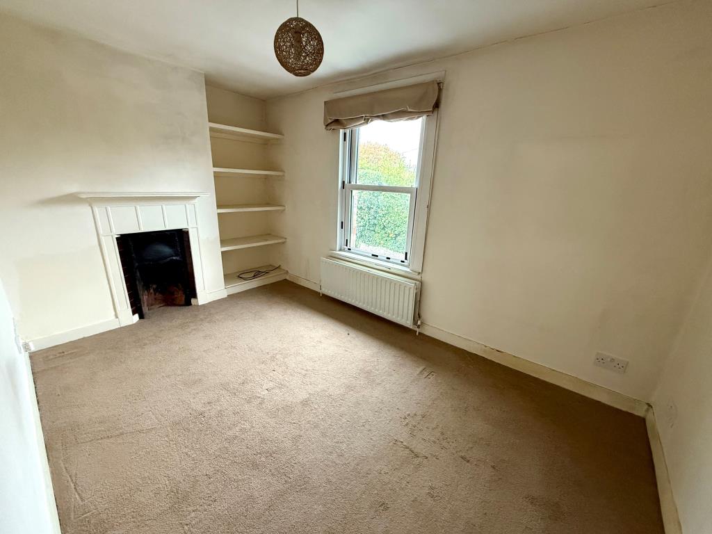 Lot: 110 - END-TERRACE HOUSE WITH OFF ROAD PARKING - Bedroom one